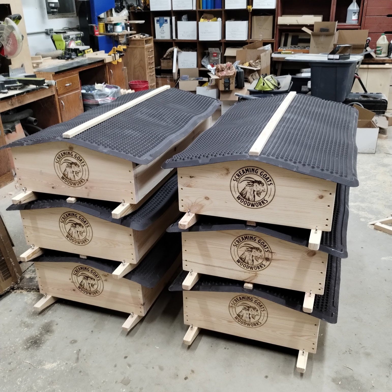 2 stacks of 3 mineral carts within the Screaming Goats Woodworks shop